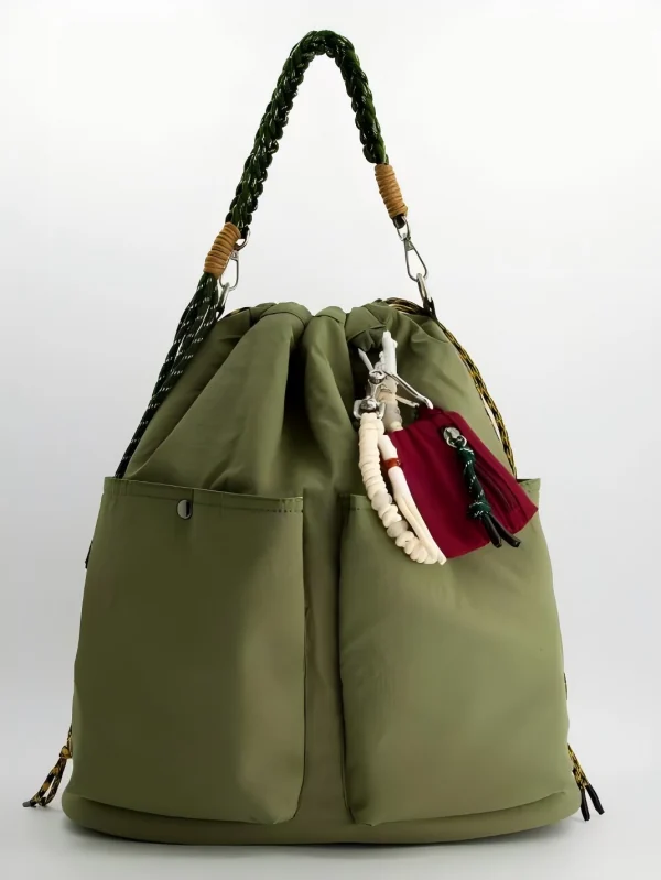 Custom Nylon Bucket Tote Bag with Button Closure and Oversized Pockets - Green bucket bag with braided handle, large external pockets and dangling pouches; whole bag